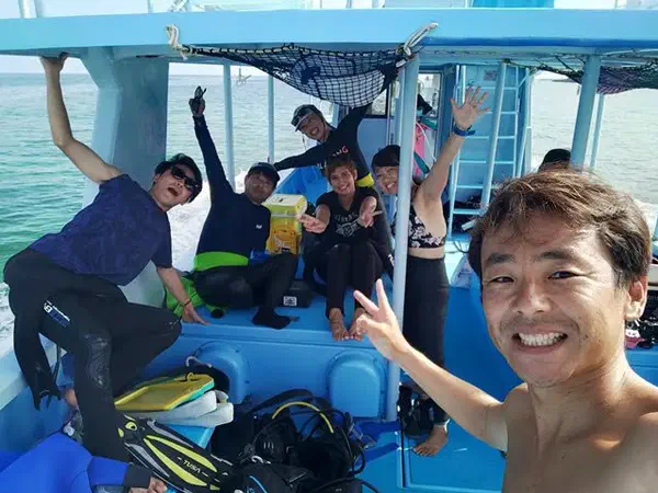Scuba diving: Back on the boat after a dive in Okinawa.