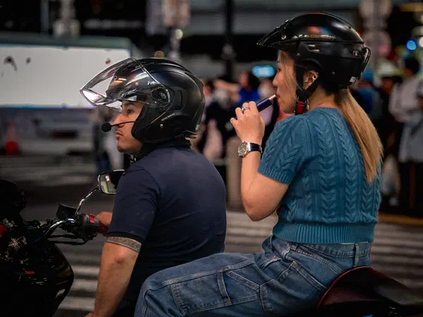 Photography: A couple waiting at the lights, Shibuya, Tokyo.