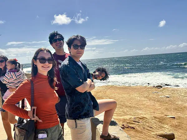 San Diego, California, United States: With friends on the rocks at the water’s edge.