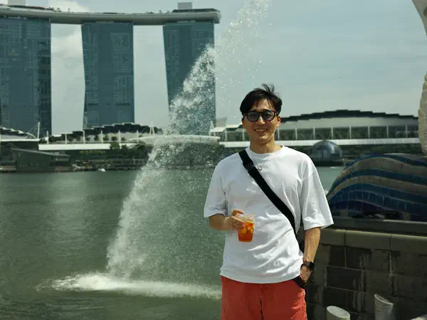 Singapore: By the Merlion, with Marina Bay Sands across the bay.